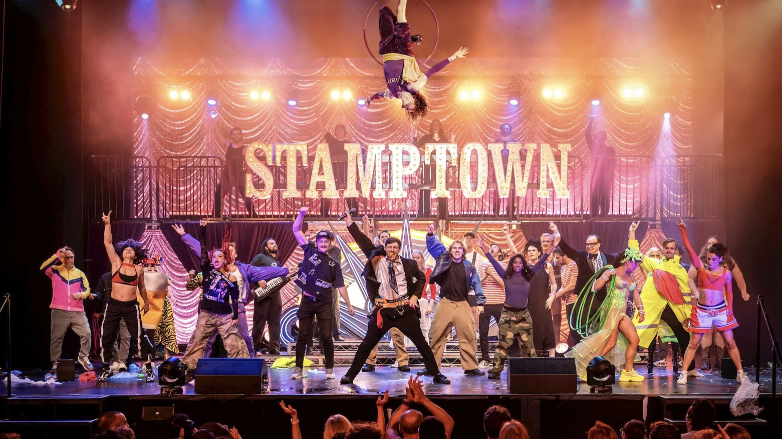 The Stamptown cast on stage at the end of the show